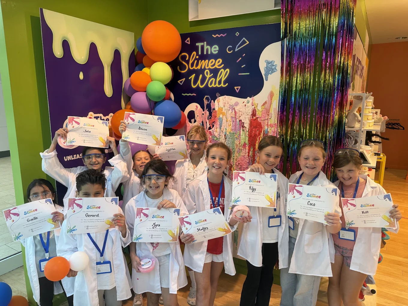 Kids with party certificates